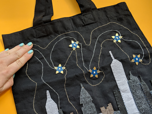 Teknikio Black Skyline Tote Kit with blue star LED boards and conductive thread.